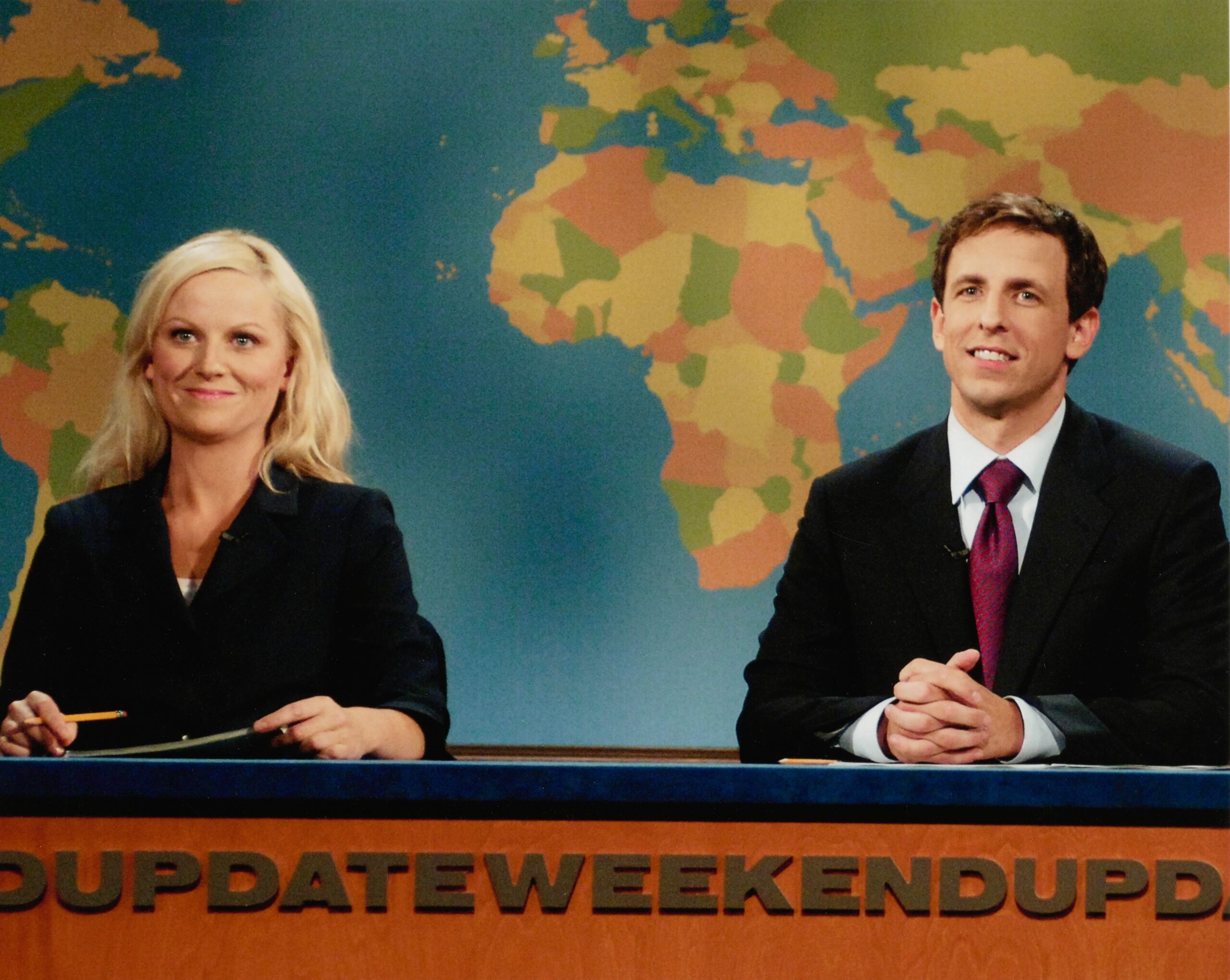 Attributed to Mary Ellen Matthews, [Amy Poehler and Seth Meyers at the Saturday Night Live Weekend Update desk], ca. 2006. Lorne Michaels Collection. Harry Ransom Center.
