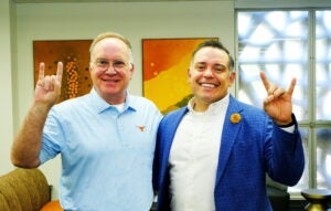 Two men standing together