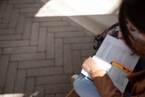 Overhead photo of student reading book