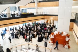 A view from above of a networking reception at an event.