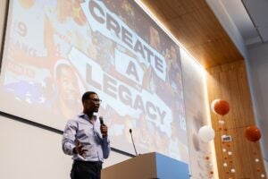 Chris Bosh speaking at an event.