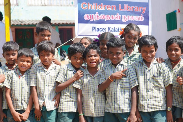 Group of children in front of library in India