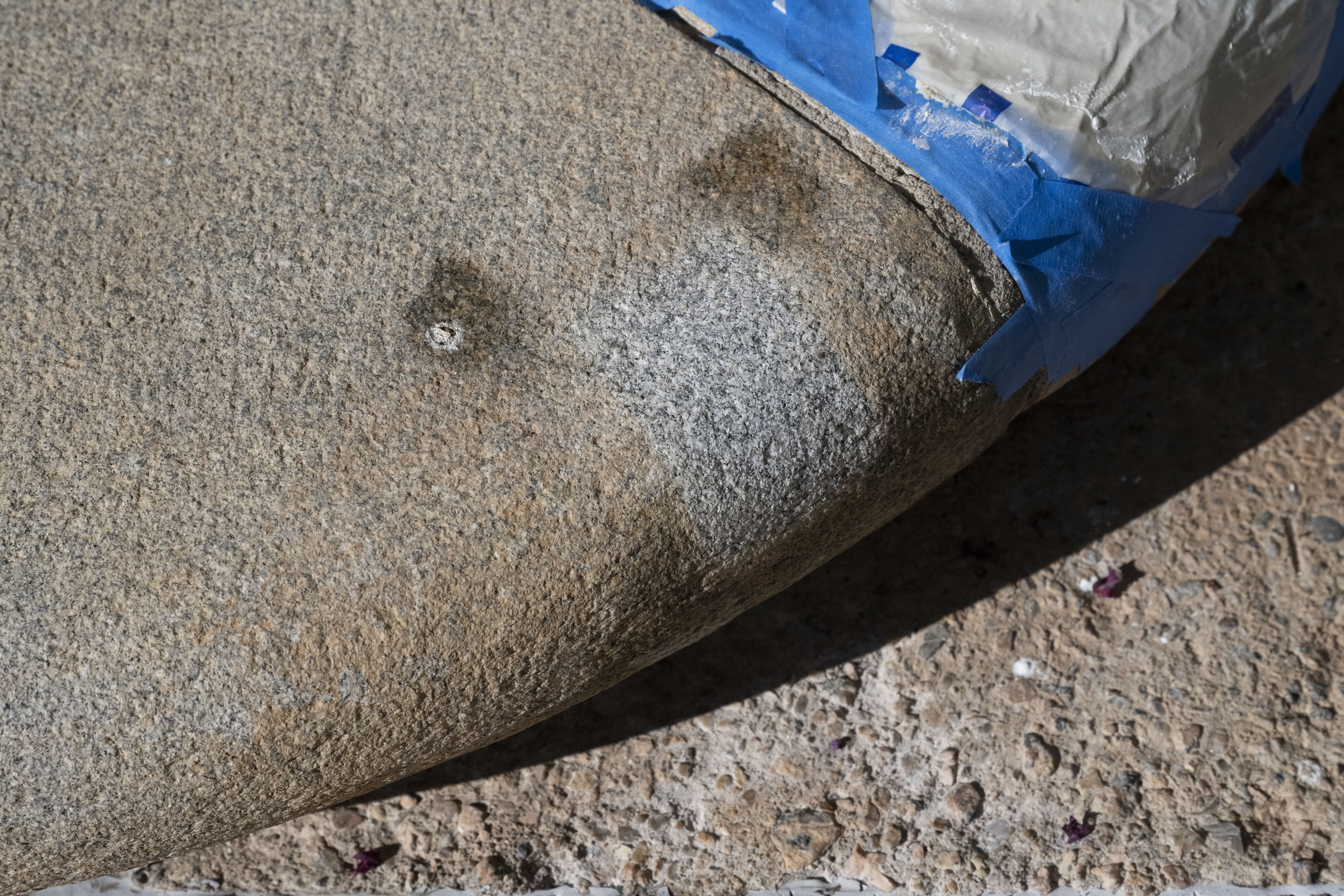Clean square on otherwise stained steps
