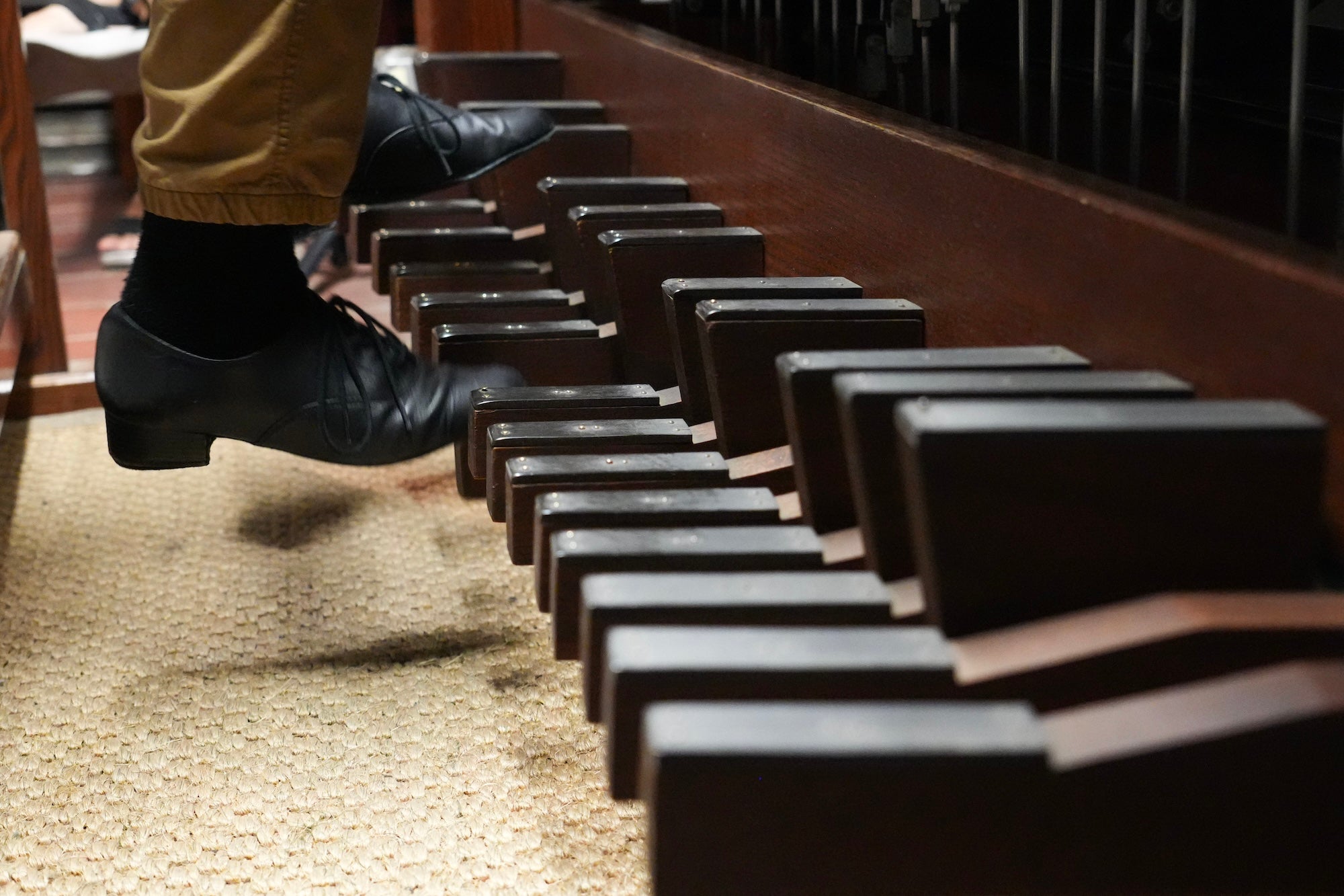 pedals of the carillon being played by feet