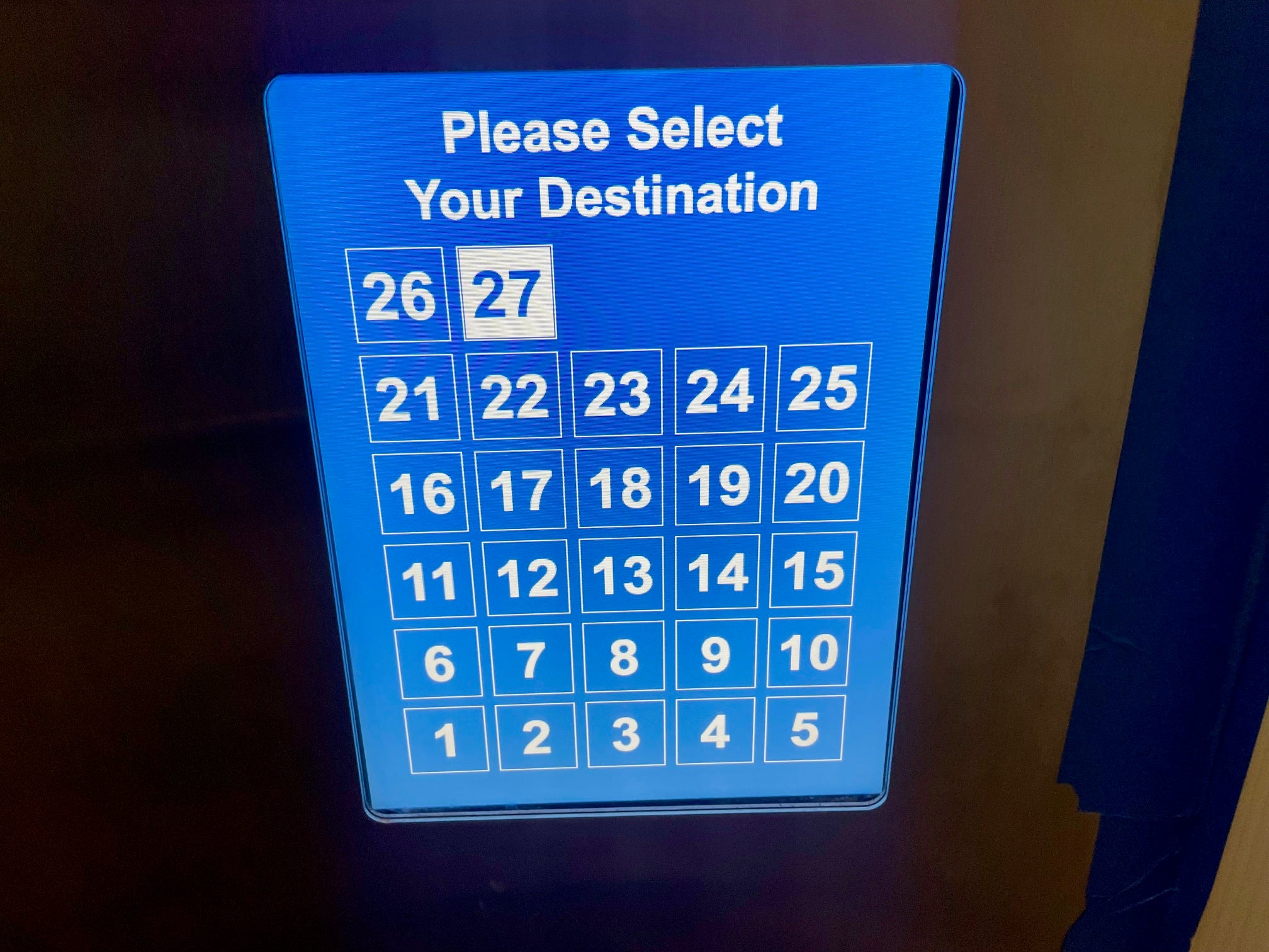 Blue LEC elevator screen with 27 lit up