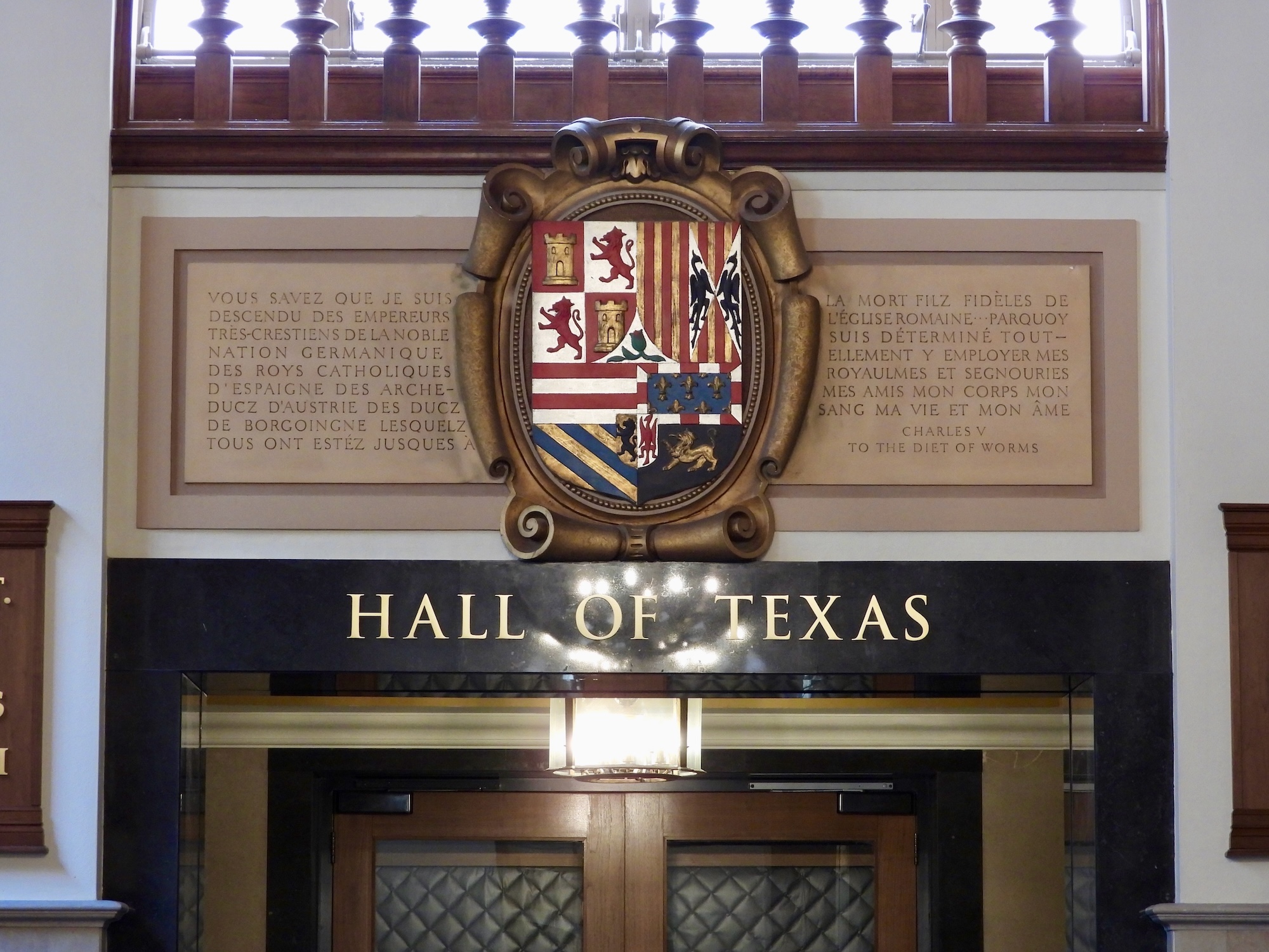 Hall of Texas entrance with coat of arms