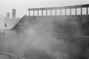 black and white image of Darrell K Royal-Texas Memorial Stadium right after a firework show