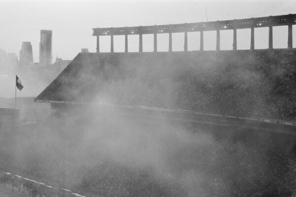 black and white image of Darrell K Royal-Texas Memorial Stadium right after a firework show