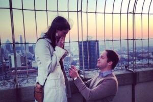 Man proposes to woman at top of Tower