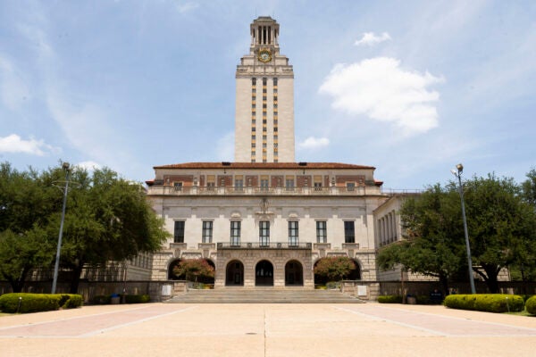 Image of the Tower from the Main Mall plaza in sunlight