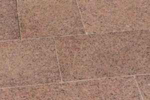 close up image of the granite on the steps of Main Building