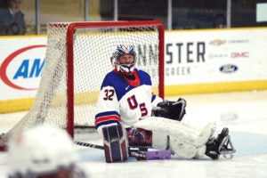 image of Team USA Sled Hockey goalie Jen Lee on the ice