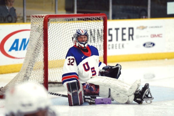 image of Team USA Sled Hockey goalie Jen Lee on the ice