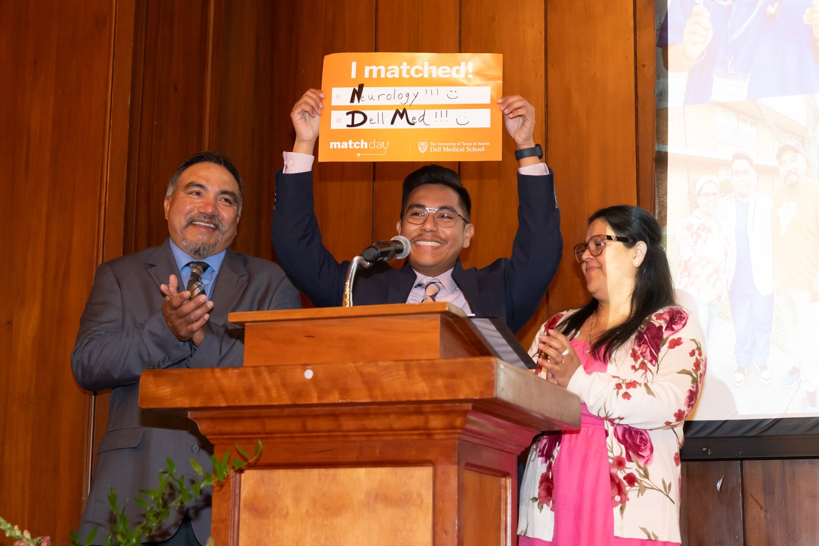 man stands with sign