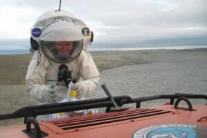 Mark Helper wears a spacesuit during a training exercise.