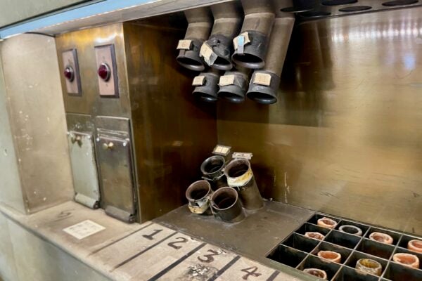 Pneumatic tube console with hand-written numbers for floors