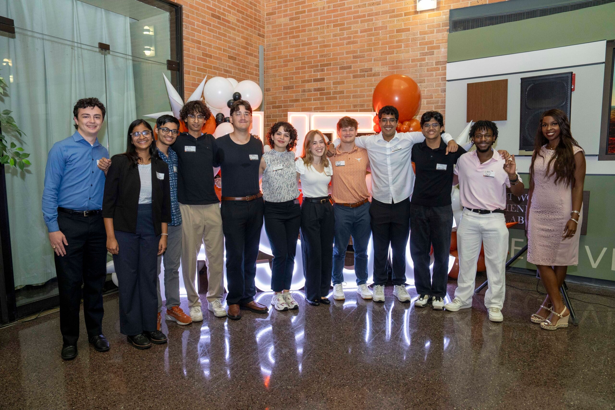 University of Texas Regional Security Operations Center student employees at the ribbon-cutting ceremony for their new office.