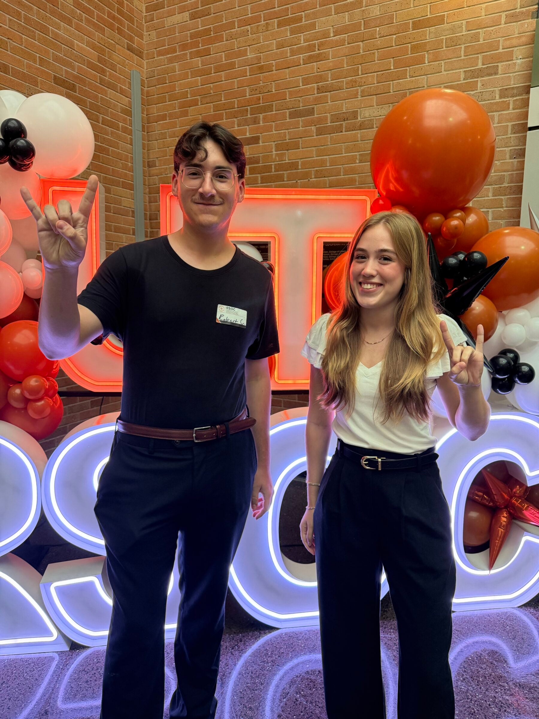 Computer science sophomores Robert Childers and Maisie Nomura at UT-RSOC’s ribbon-cutting ceremony.