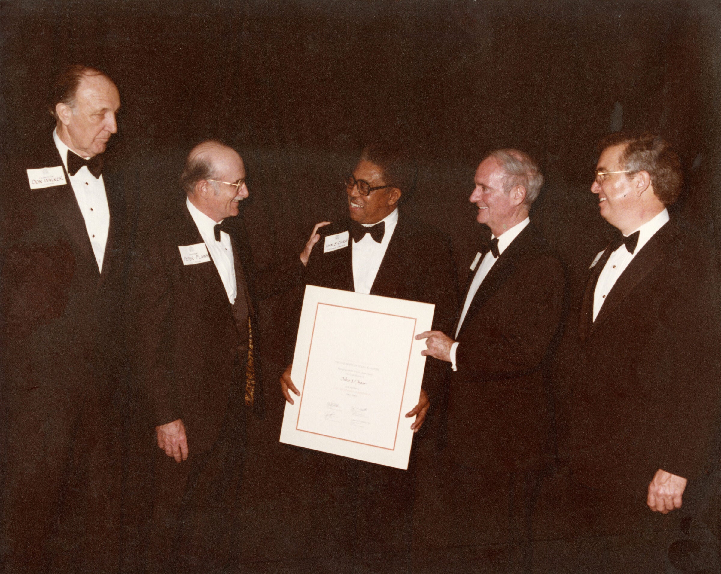 John S. Chase receiving the AIA Fellowship from UT President Emeritus Peter Flawn and others